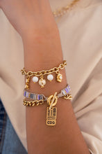 Cargar imagen en el visor de la galería, Pulsera Con Dijes Variados + Aretes
