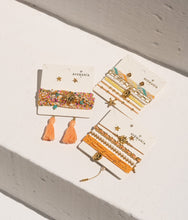 Cargar imagen en el visor de la galería, Pulsera Tejida con Dije de Sol + Aretes
